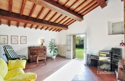 Landhus købe Castagneto Carducci, Toscana, RIF 3057 Zimmer mit Zugang zum Garten