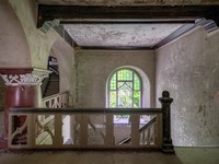 Upper floor: staircase and lead-glass window